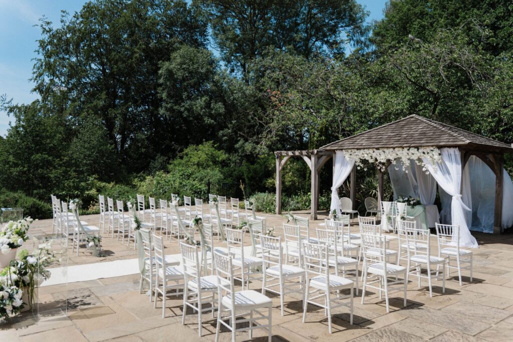 A wide angle view of a patio wedding ceremony.